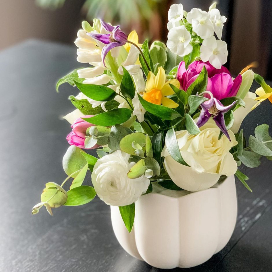 floral arrangement in vintage soup bowl