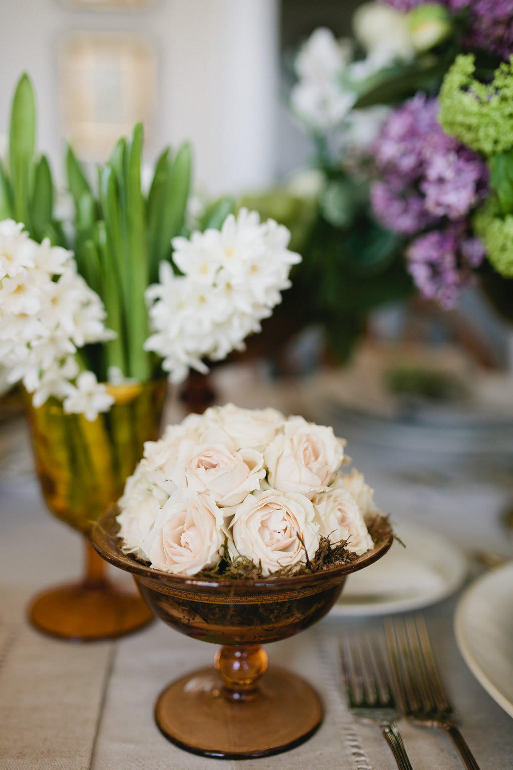 floral arrangement in vintage soup bowl